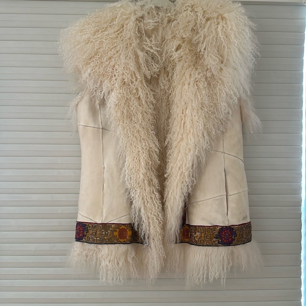 Mob Wife meets Snow Bunny ESCADA Sport Tibet Lamb leather & curly hair vest.